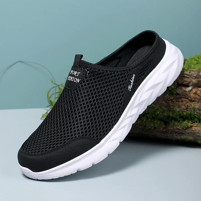 Sideprofil av menns pustende slip-on halvsko i lett design. Komfortabel fritidssko for menn.