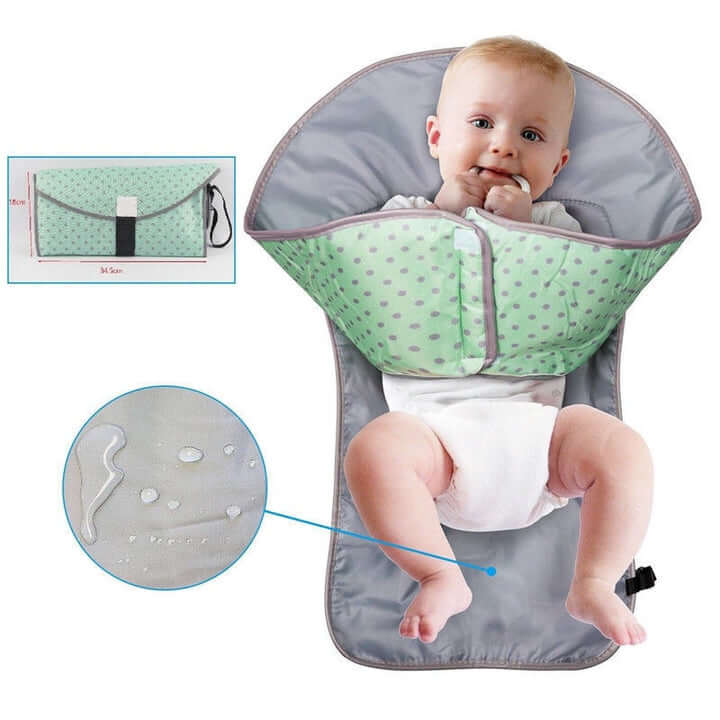 Åpen bleieskiftepute med myk, vanntett overflate, beskytter babyen under bleieskift.