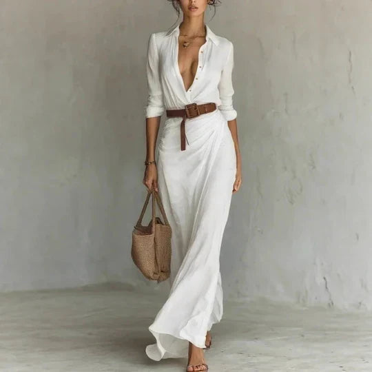 Elegante ensfarget kvinnes langermet midikjole med chic belte, ideell for et sofistikert utseende. Dameklær.