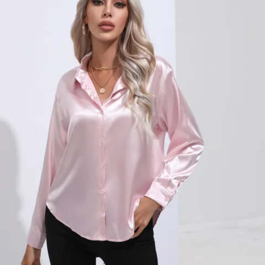 Elegant, løs passform damebluse med lange ermer; perfekt for moderne kvinner.