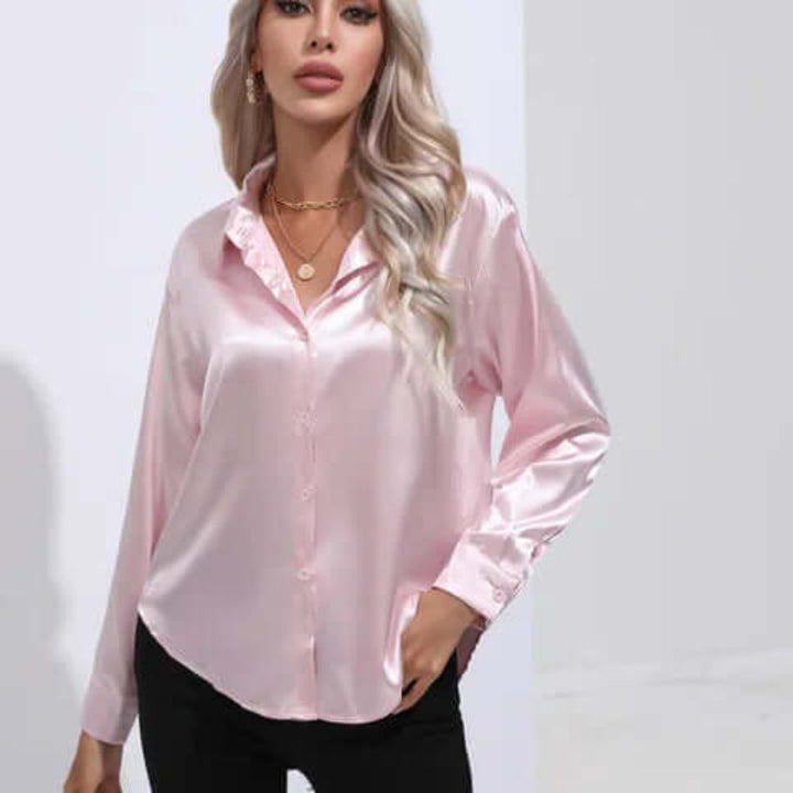 Elegant, løs passform damebluse med lange ermer; perfekt for moderne kvinner.