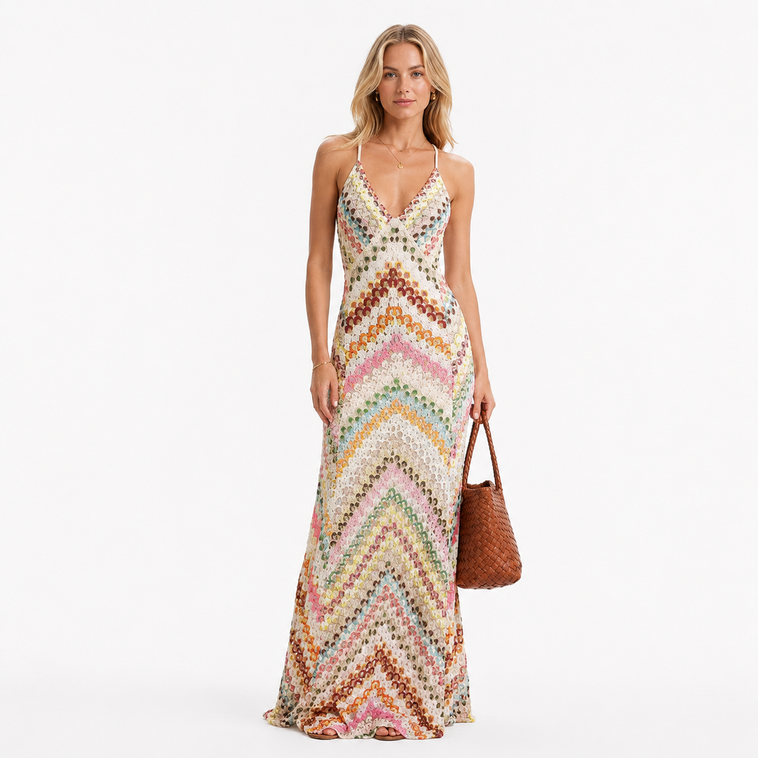 Dame ermeløs boho maxikjole i grønt. Lang kjole med dyp V-hals og elegant silhuett, perfekt for sommerdager.