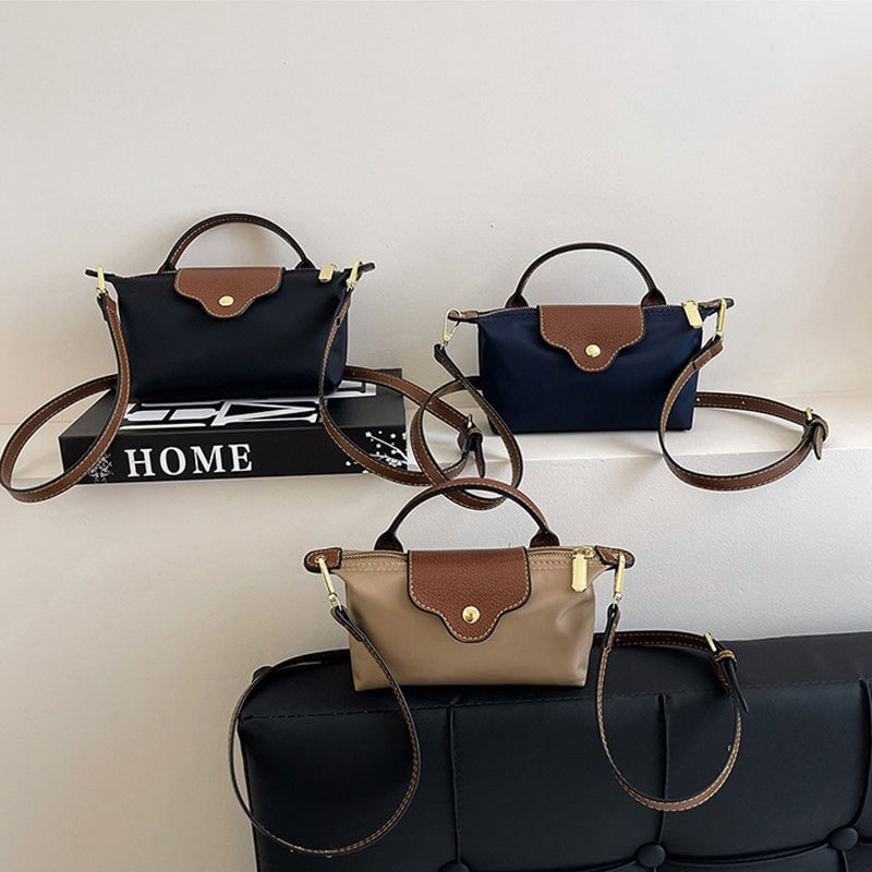 Liten, men romslig fargeblokk skulderveske, elegant nylon crossbody for moderne kvinner.