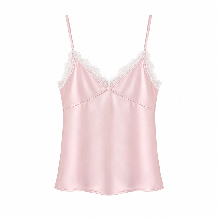 Moderne dametopp med elegant V-hals og åpen rygg. En ermeløs festtopp som passer perfekt til sommerstil.