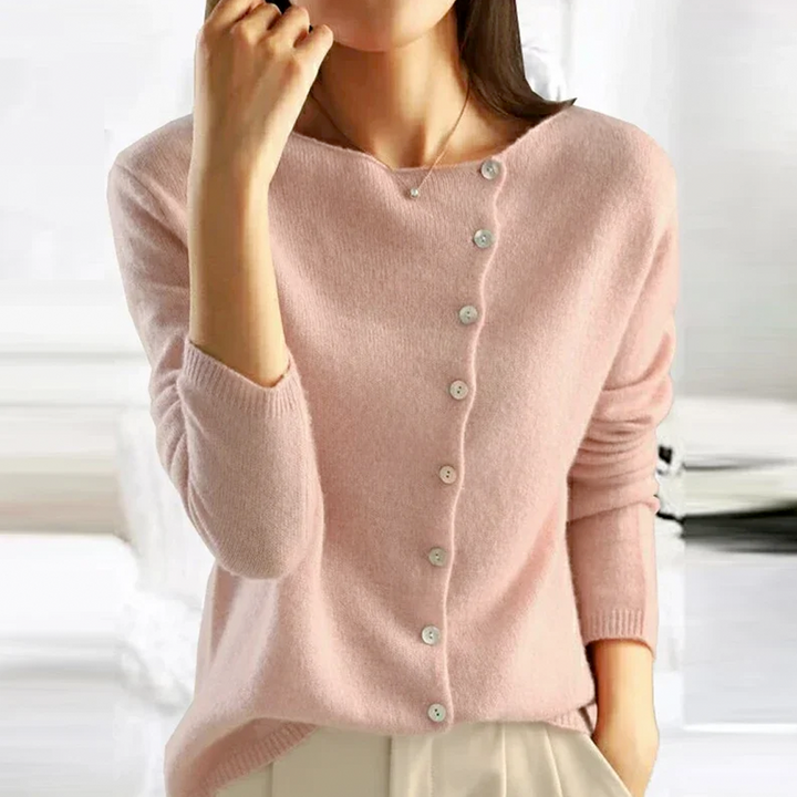 Allsidig strikkegenser til dame med stilige knapper, ideell for casual og elegant bruk.