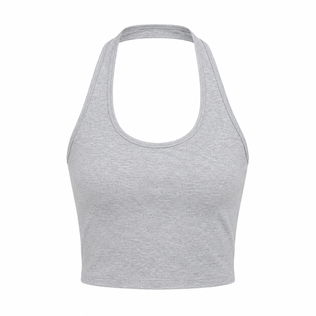 Trendy blomstret ryggløs halter crop topp til dame. Ideell for sommerferie, strand og hverdagsbruk.
