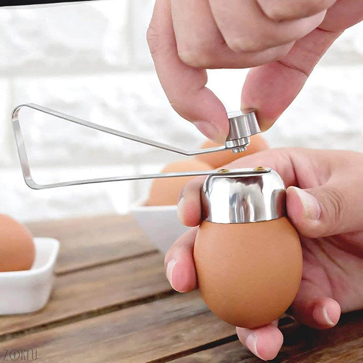Slitesterk eggeknekker i rustfritt stål for frokost. Gjør det enkelt å knekke egg uten søl eller skall.