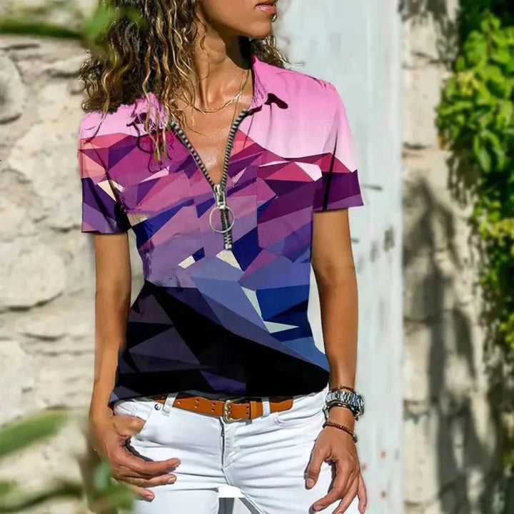 Chic damebluse for sommerdager og vår. Elegant og komfortabel flerfarget topp i pastell, perfekt for kvinners stil.