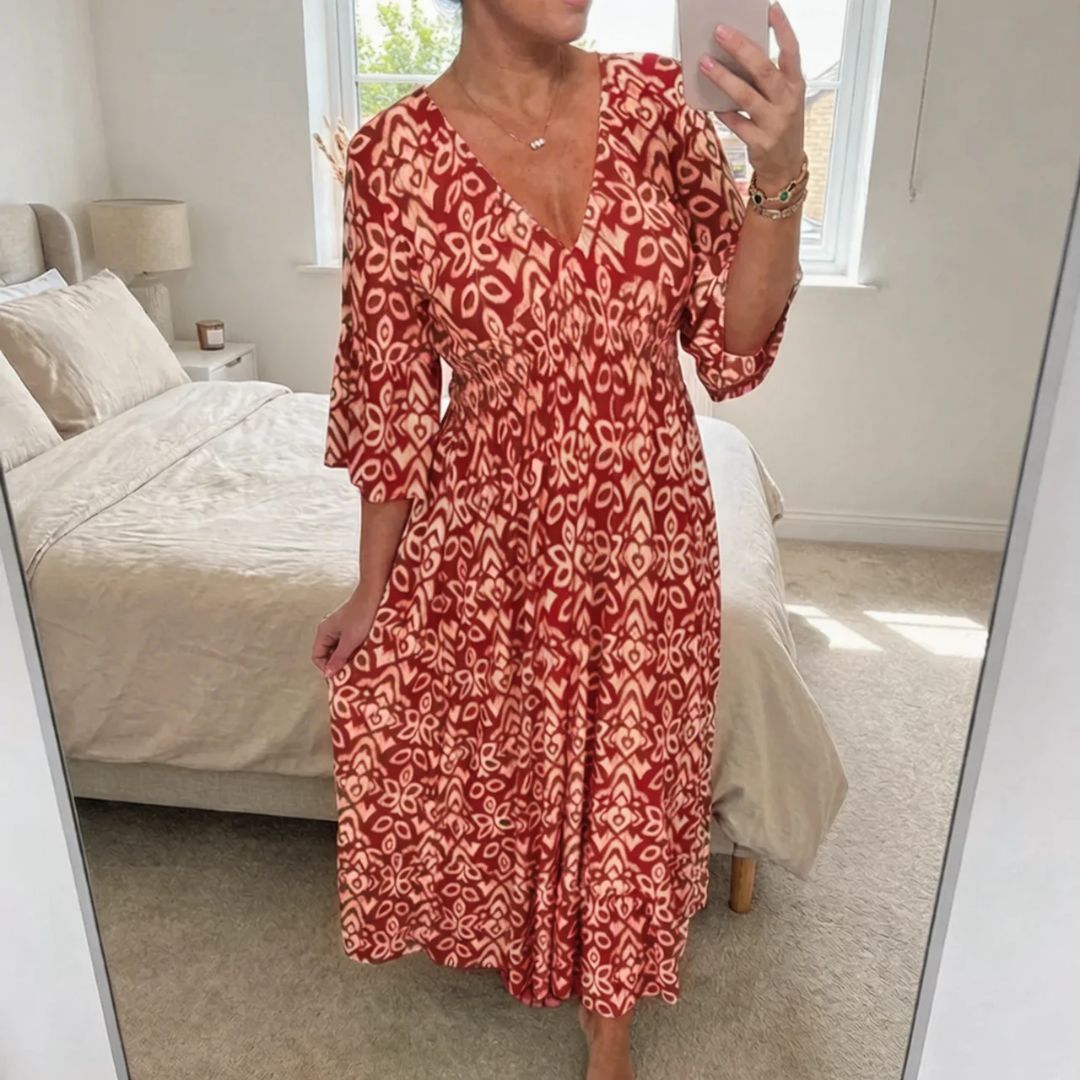 Elegant maxikjole for kvinner med V-hals og trykk, perfekt for sommer, fest og hverdag.