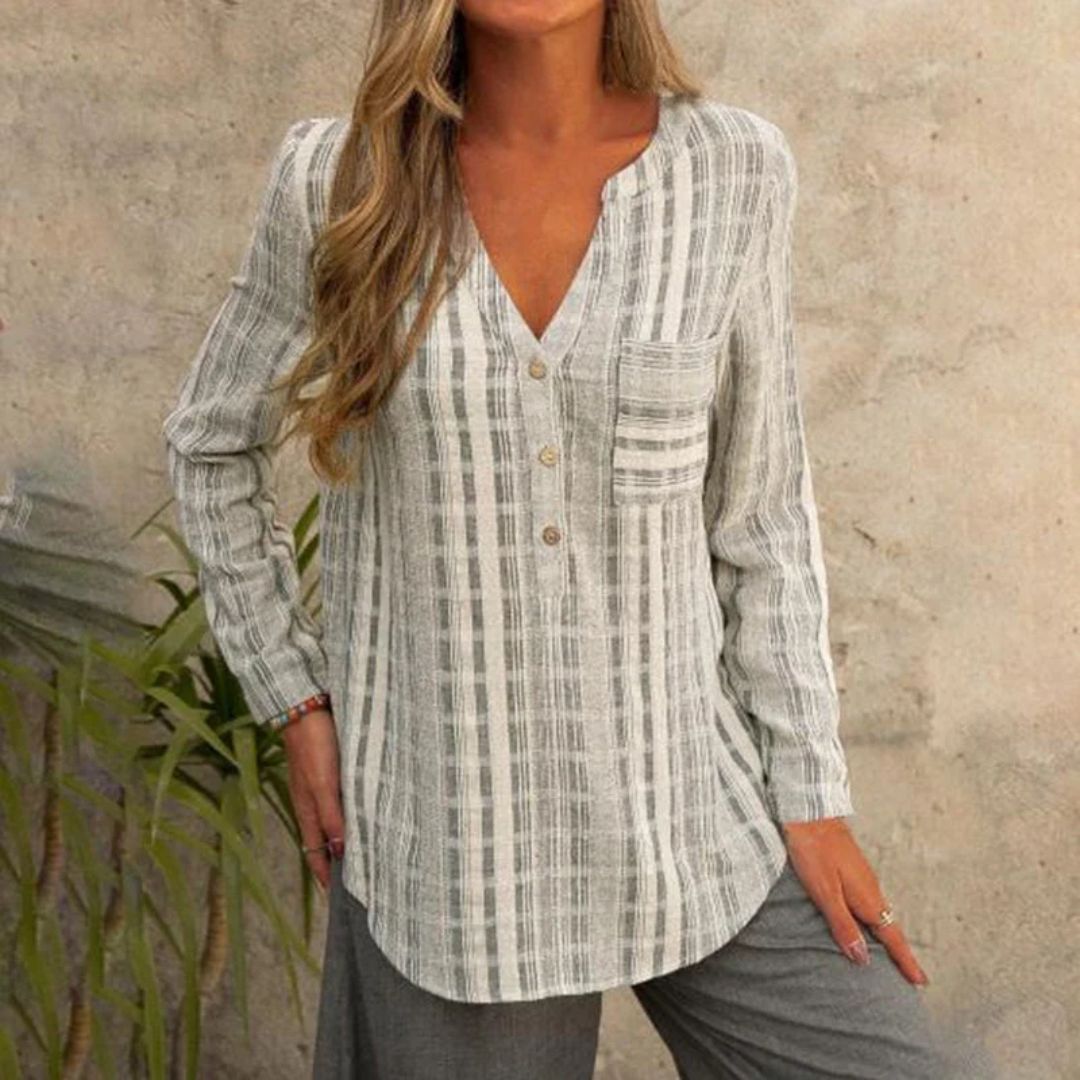 Langermet damebluse med stripete mønster og elegant V-hals for komfortabel hverdagsbruk.