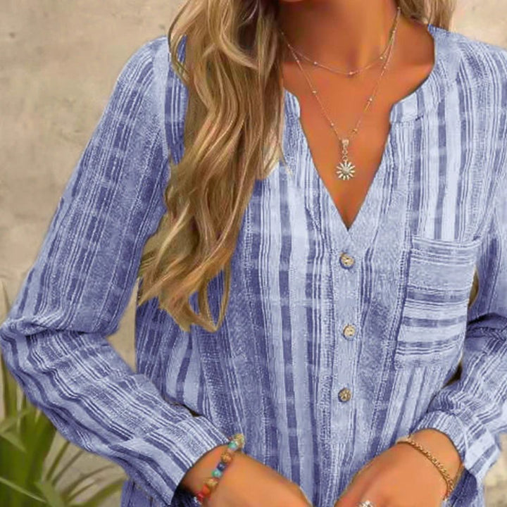 Fritidsbluse for damer: stripete, langermet og med V-hals. Elegant og komfortabel for vår og høst.