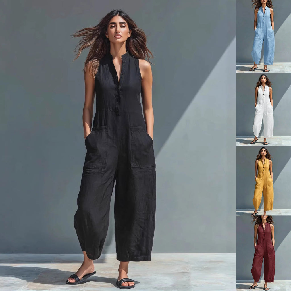 Ermeløs dame jumpsuit med V-hals, praktiske lommer og vide ben for avslappet sommerstil.