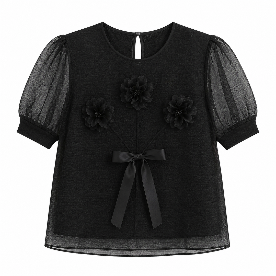 Oransje plissert festtopp for dame med 3D-blomster og elegante puffermer. Ideell feminin sommertopp.
