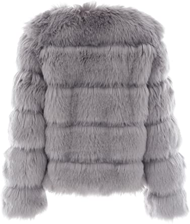 Fluffy, varm fuskepelskåpe med tidløs stil. Perfekt damekåpe for en elegant vinterlook.