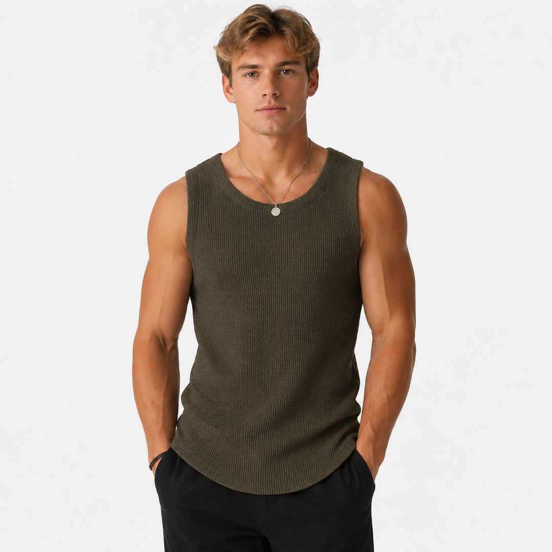 Ermeløs muskeltopp for herre, designet for bodybuilding og gym. Stilig og komfortabel fitness tanktop.