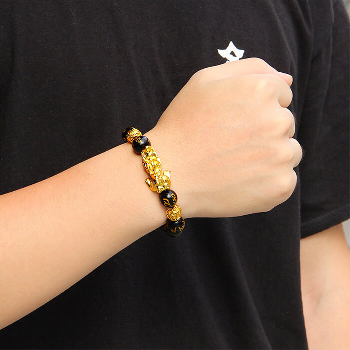 Svart obsidian Pi Xiu armbånd: beskyttelse, lykke og velstand. Unisex design.