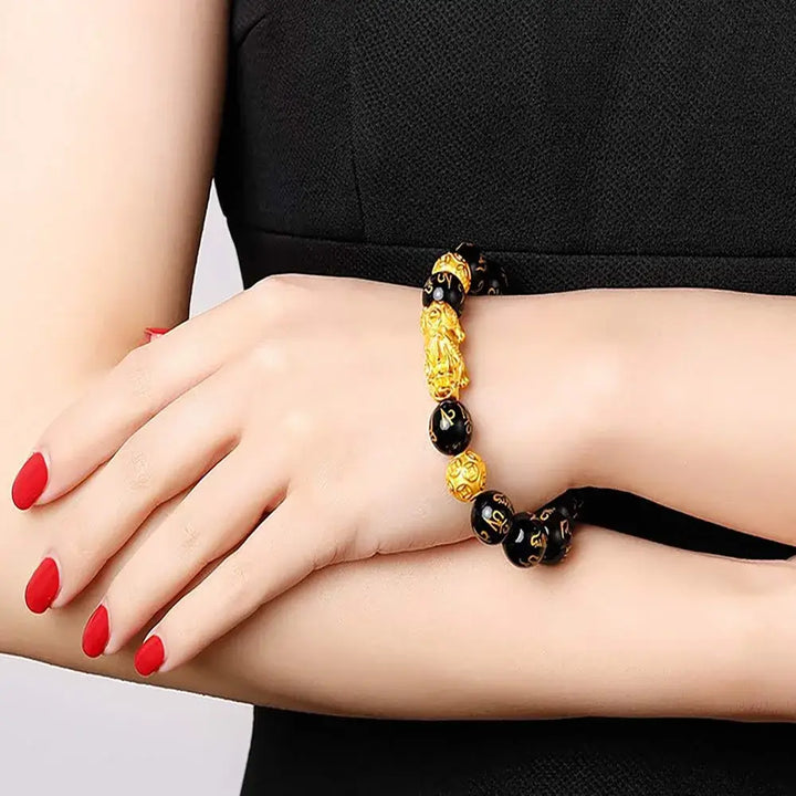 Feng Shui obsidian armbånd for rikdom, lykke, beskyttelse og energi. Unisex smykke.