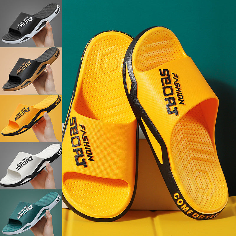 Svart og hvit unisex bassengsandal, hurtigtørkende og komfortabel.