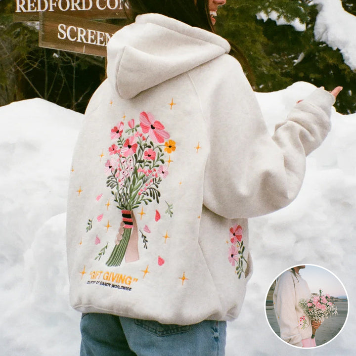 Allsidig hvit hoodie for damer. Perfekt for casual vår- og høstantrekk med fokus på komfort.