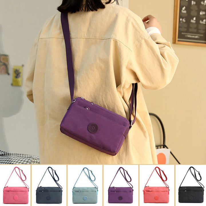 Lettvekt dame crossbody-veske i nylon; en stilfull og praktisk skulderveske for aktive kvinner.