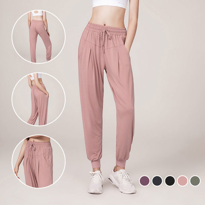 Allsidig jogger for kvinner; høy midje design for trening eller fritid. Cupro bukse som gir stil og komfort.