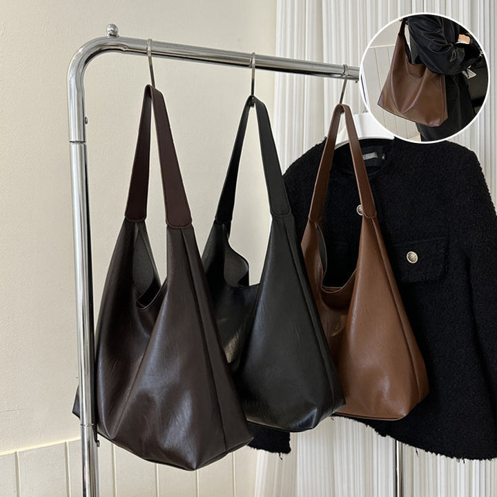 Elegant svart dameskulderveske i PU, vestlig stil, med justerbar stropp for hverdagsbruk.