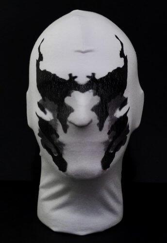 Slående Rorschach maske med intrikate, bevegelige blekkflekker, perfekt for Halloween og temakvelder.