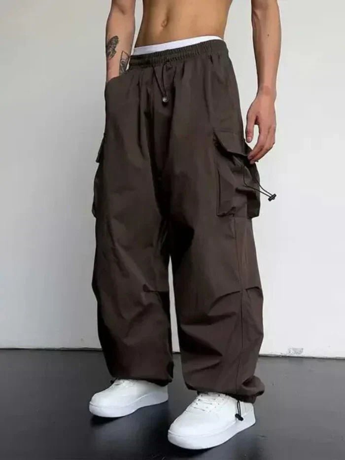 Blå menns brede cargo-bukser for hverdag og casual streetwear. Med praktiske lommer og justerbar midje.