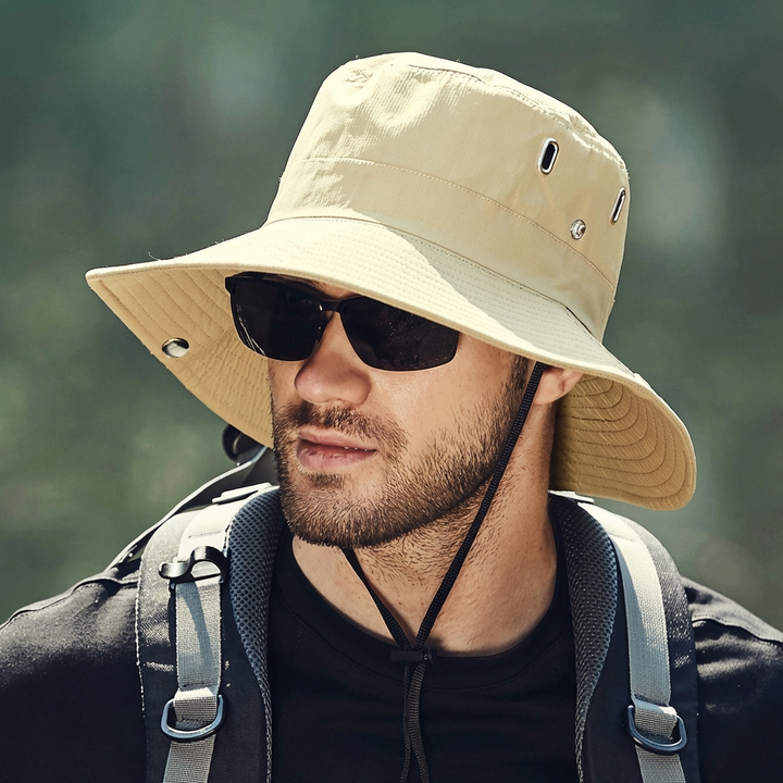Unisex solhatt i stoff med høy UV-beskyttelse. Essensielt hodeplagg for solfylte utendørsopplevelser.