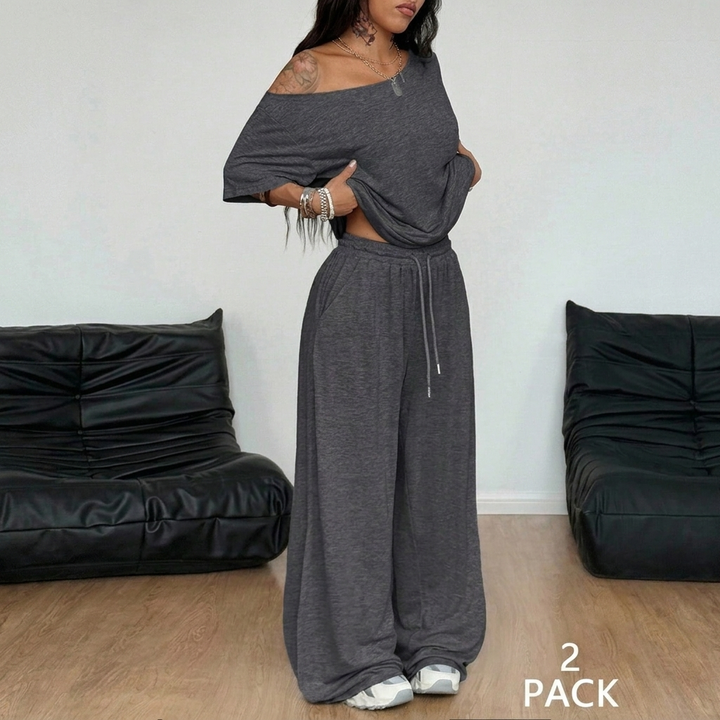 Minimalistisk, ensfarget 2-delt loungesett for kvinner. Komfortabelt hjemmetøy og fritidsklær i polyester.