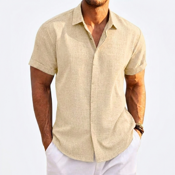 Pustende linblanding kortermet t-skjorte for menn. Løs og komfortabel, perfekt for en avslappet sommerlook.