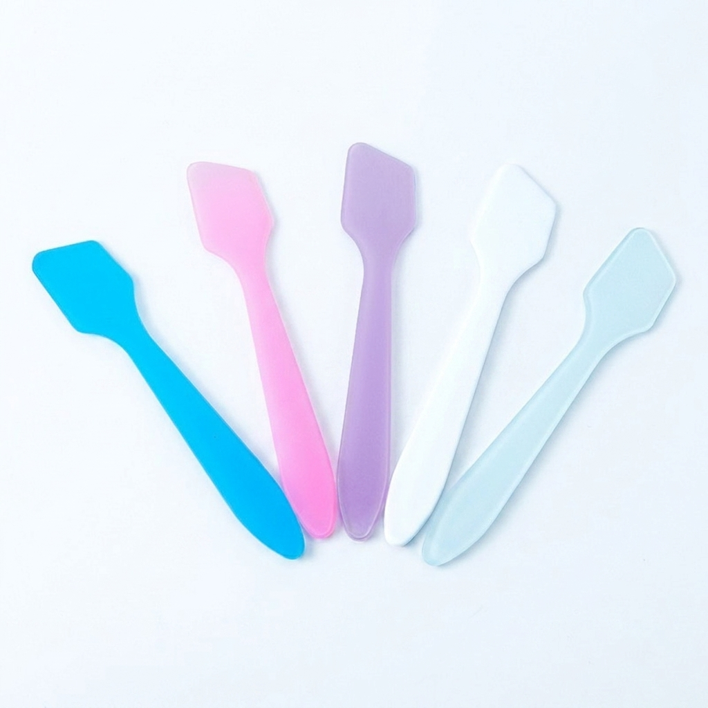 Unisex mini kosmetikkspatel for hygienisk påføring av hudpleie og ansiktskrem, gjenbrukbar applikator.