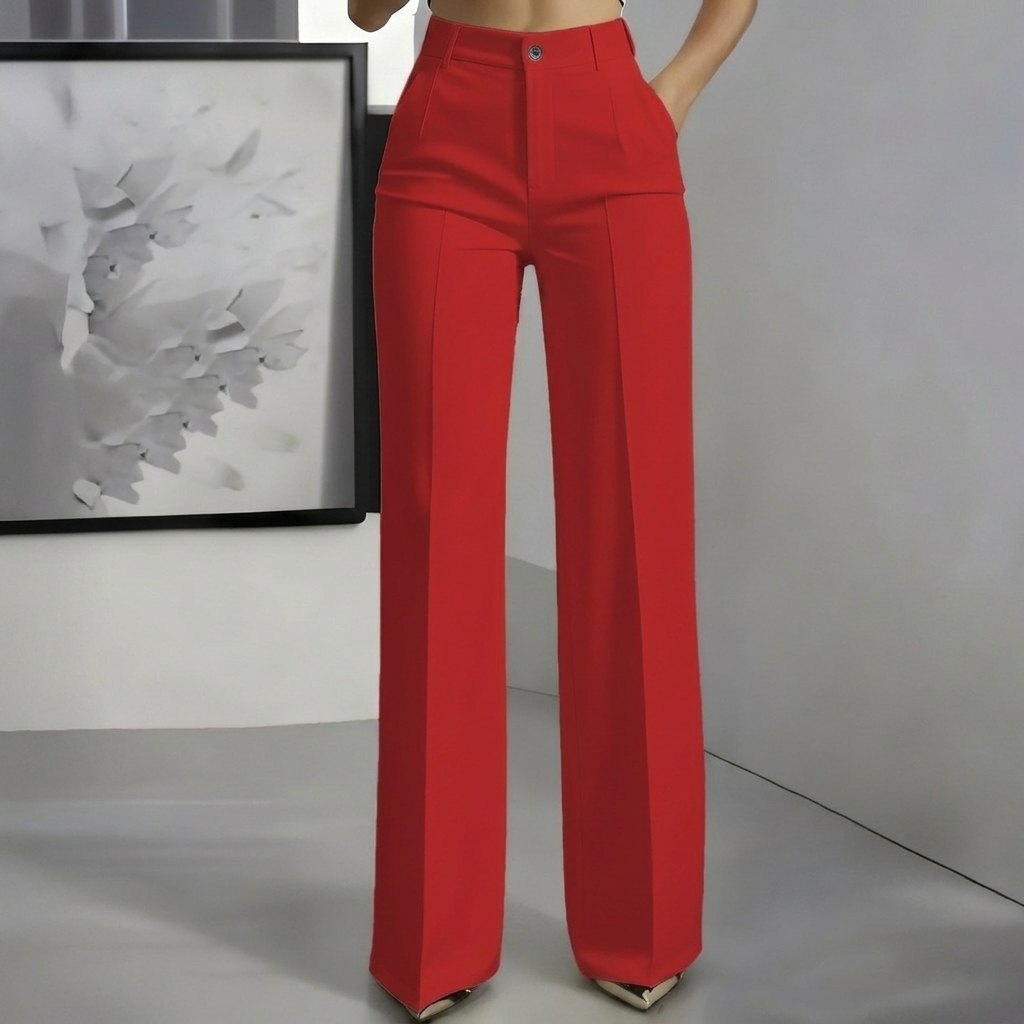 Dame demonstrerer fleksibilitet i elegante, minimalistiske polyesterbukser; ideelle for sommer og vår.