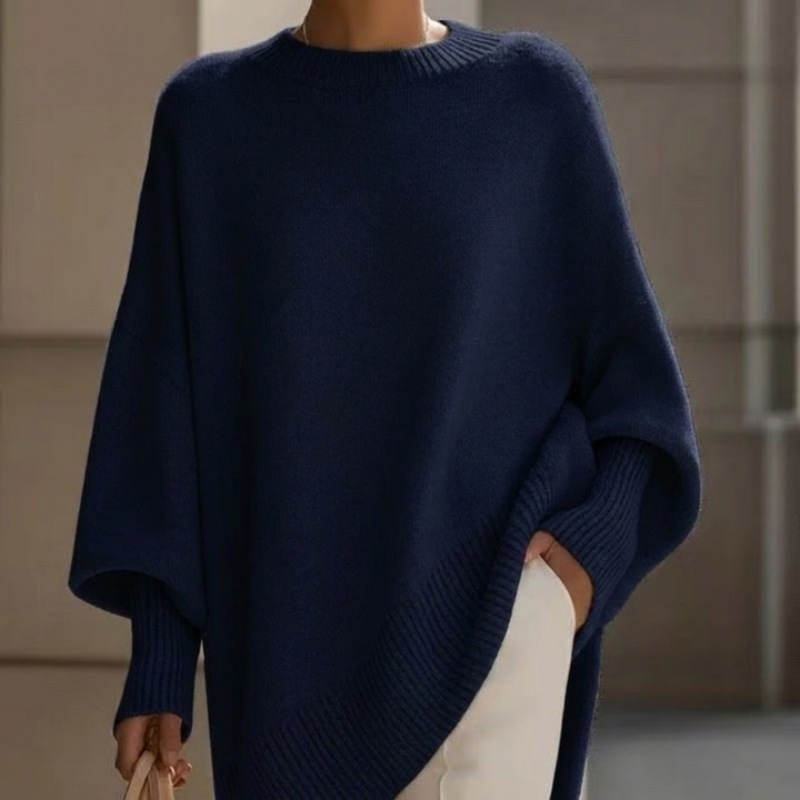 Elegant tykk strikket damegenser med rund hals. En varm og moderne høst/vintergenser for damer.