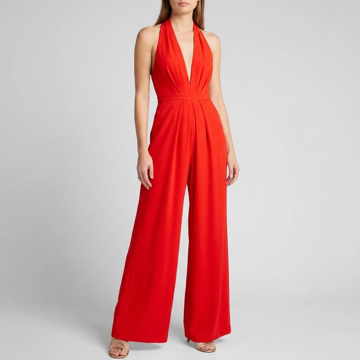 Elegant dame jumpsuit med halterneck og brede bukseben, perfekt for fest og spesielle anledninger.