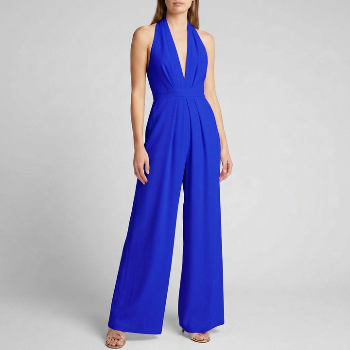 Feminin halterneck jumpsuit med brede ben, viser elegant rygg og passer til både fest og hverdag.