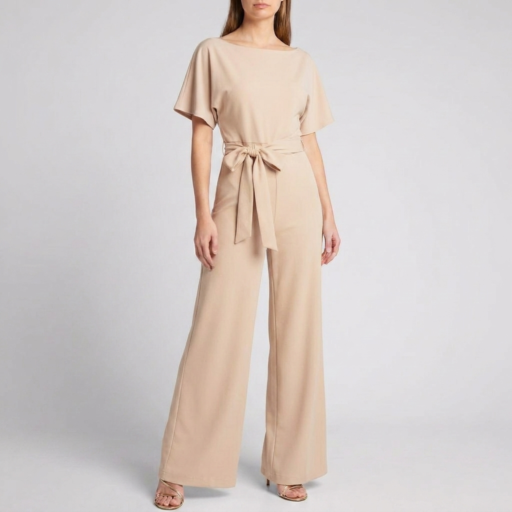Allsidig kvinners jumpsuit med belte. Kortermet, vide ben. Fra casual sommer til elegant festantrekk.