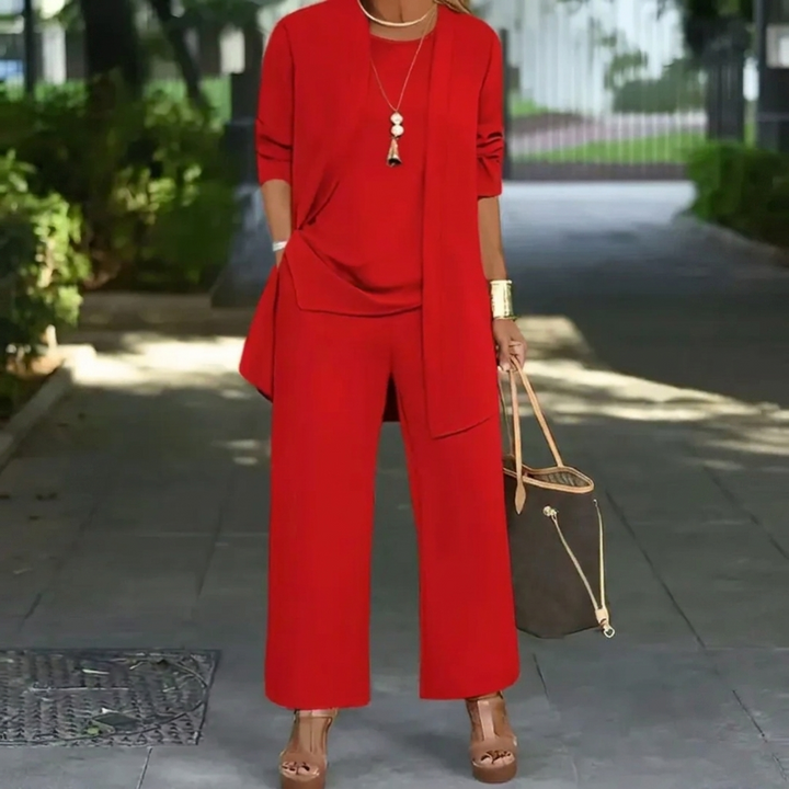 Moderne 3-delt draktsett for damer med lang cardigan, matchende topp og trendy vide bukser. Allsidig bruk.