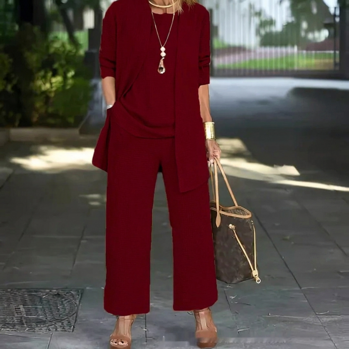 Elegant 3-delt damesett med lang cardigan, ermeløs topp & vide bukser. Perfekt for motebevisst hverdag.