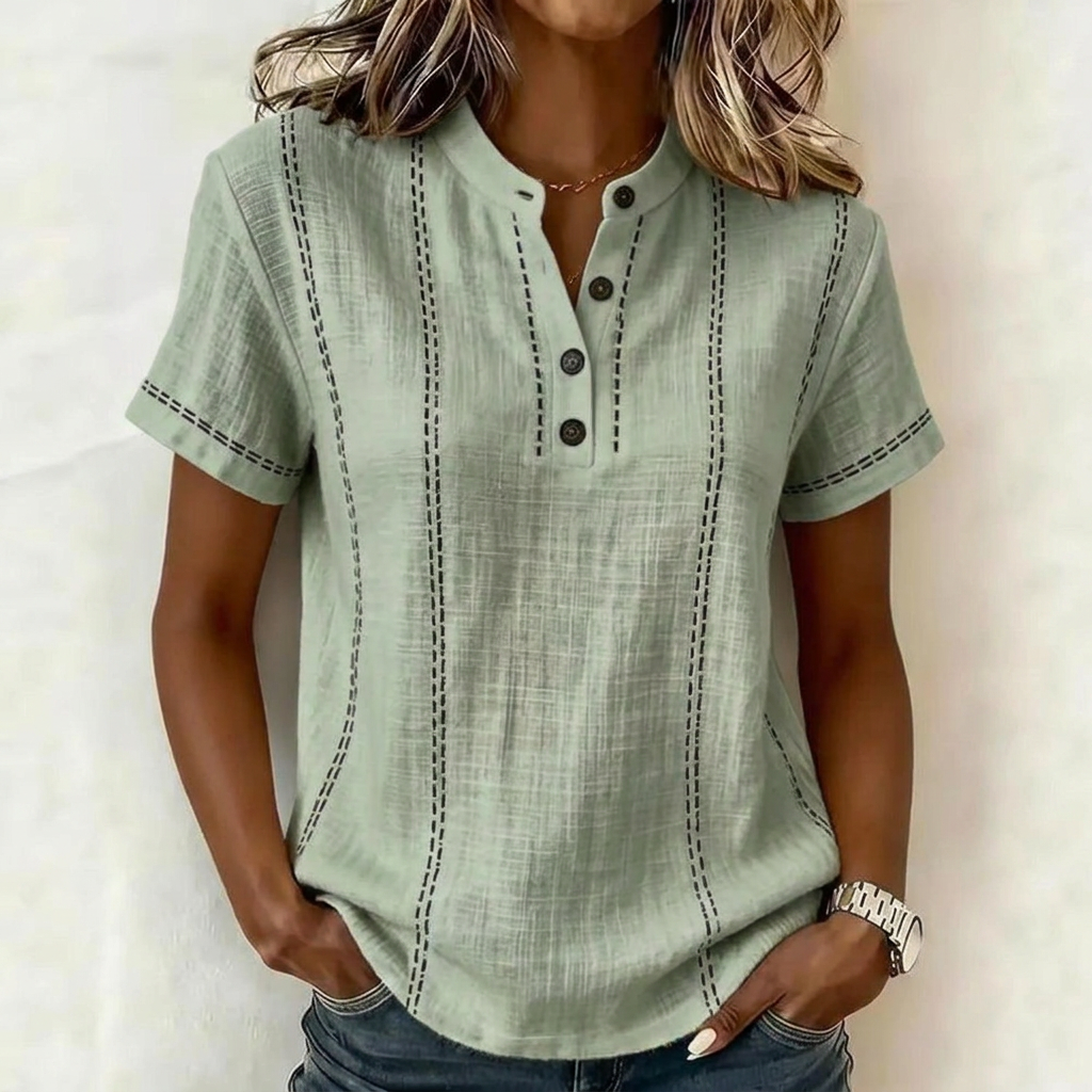 Motebevisst kvinners stripete bluse med V-hals. Kortermet sommerbluse med knapper for et elegant og avslappet utseende.