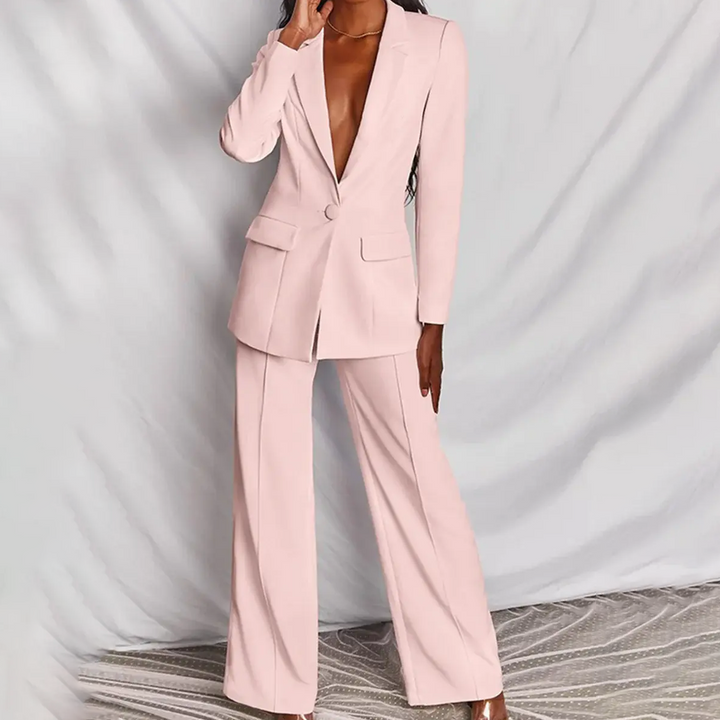 Elegant damekontor dressett med blazer og dressbukse i profesjonell stil, perfekt for kontorantrekk.