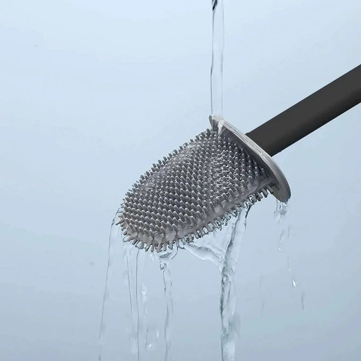 Slitesterk silikonbørste for toalett, med pustende veggfeste for rask tørking og god hygiene.
