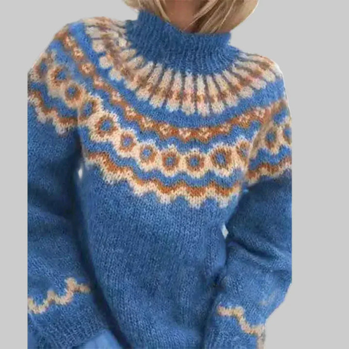 Nærbilde av elegant, langermet strikkegenser i varm, myk strikk. Rund halsdetalj for kvinne.