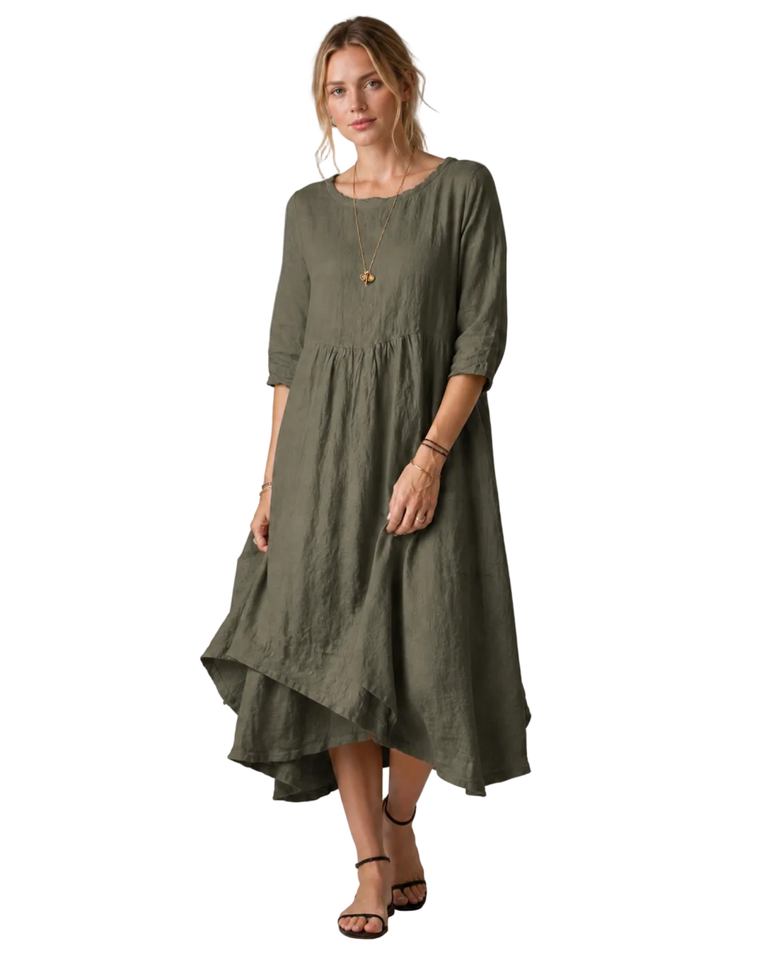 Elegant kvinne midikjole med albuelange ermer, vintage-inspirert stil for hverdag og sommerbruk.