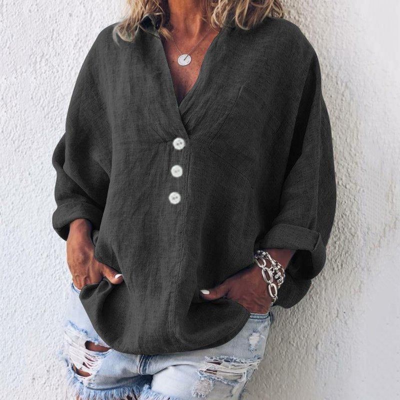 Komfortabel oversized damebluse med V-hals. Løs passform i lin, perfekt for avslappet stil eller kontorbruk.