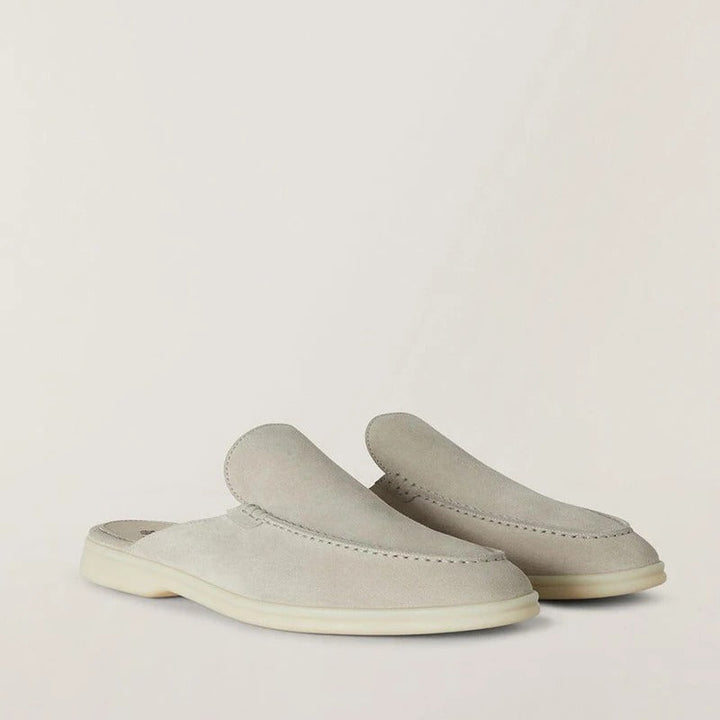 Elegante slip-on loafers i brunt skinn, ideelle for et polert kontorantrekk eller en kveldsbegivenhet.