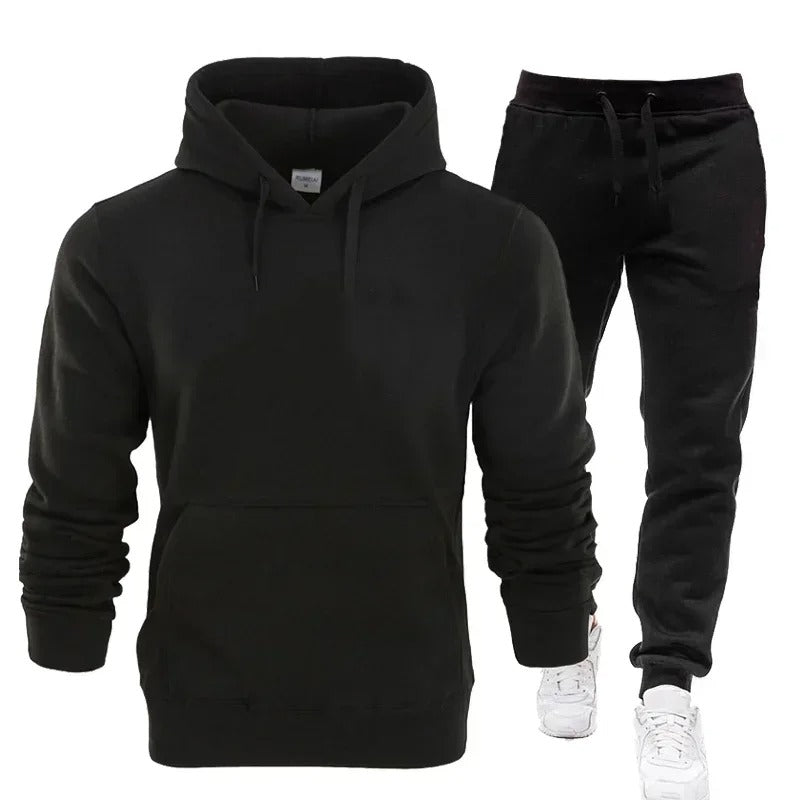 Menns treningsgensersett med hettegenser og joggebukse i grått. Optimal komfort for sport og fritid.