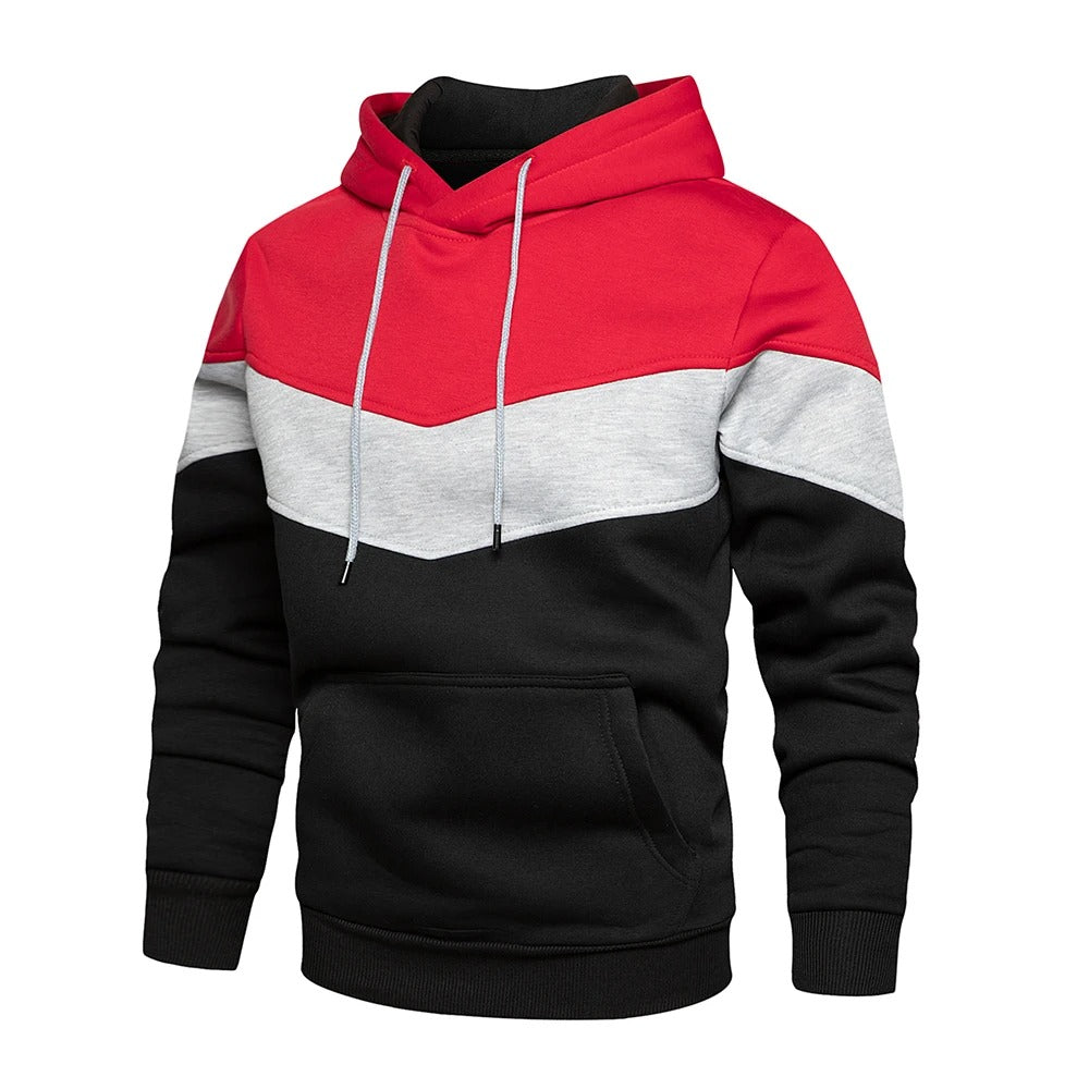Herre hettegenser for streetwear, med iøynefallende patchwork og romslig hette. Gir varme og stil.