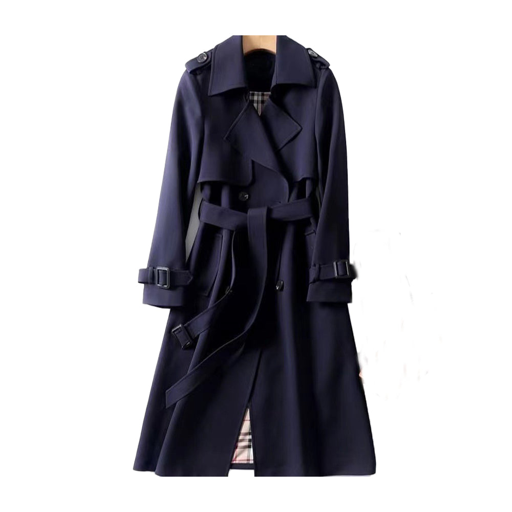 Tidløs dame trenchcoat i klassisk stil, med belte og dobbel rad. Ideell for vår- og høstmote.