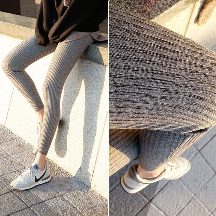 Ung kvinne viser frem svarte leggings med høy midje; fremhever passform og mote.